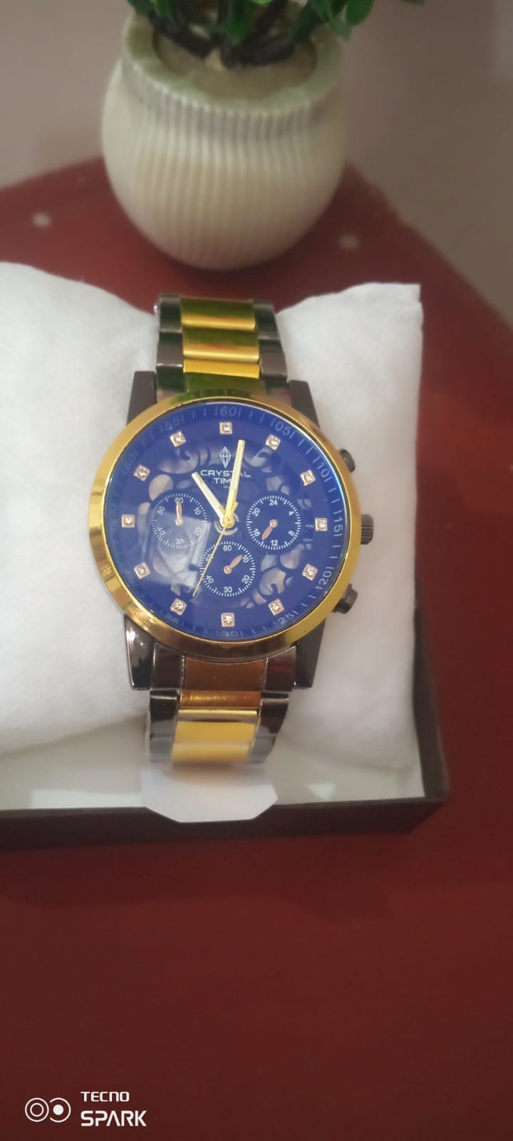 crystal time golden & black colour with blue shade black dial