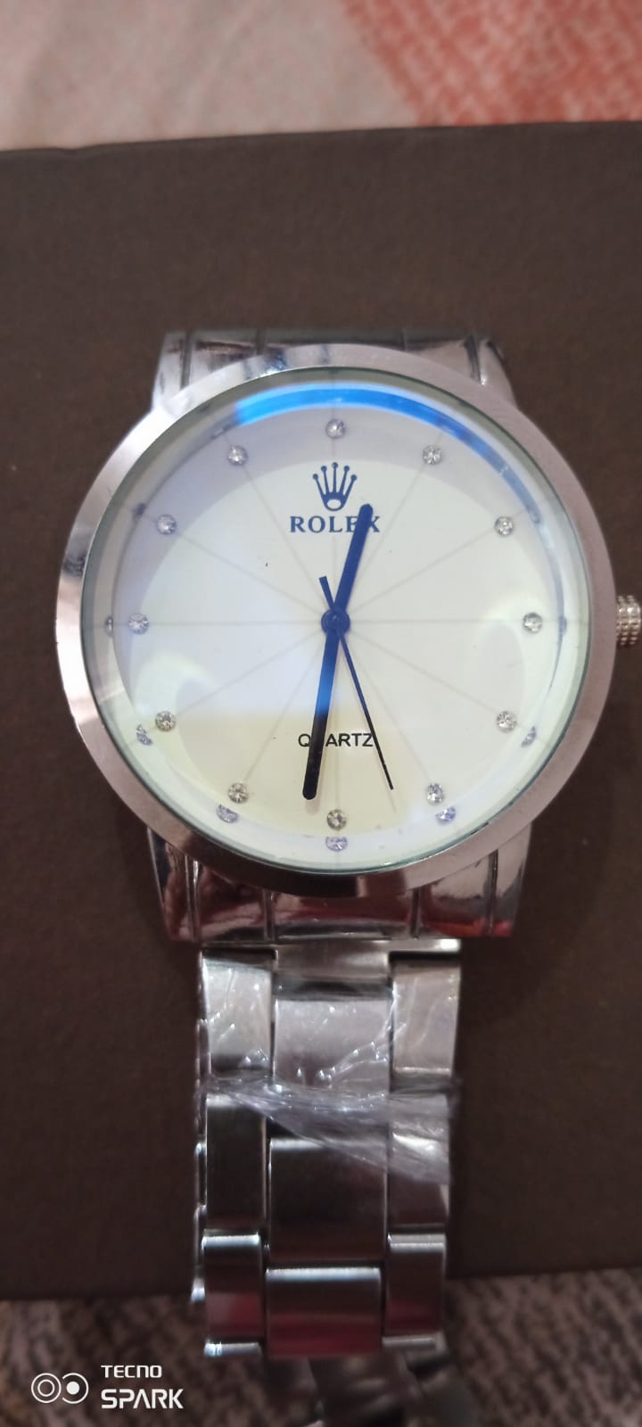 rolex silver chain &blue shade & white screen