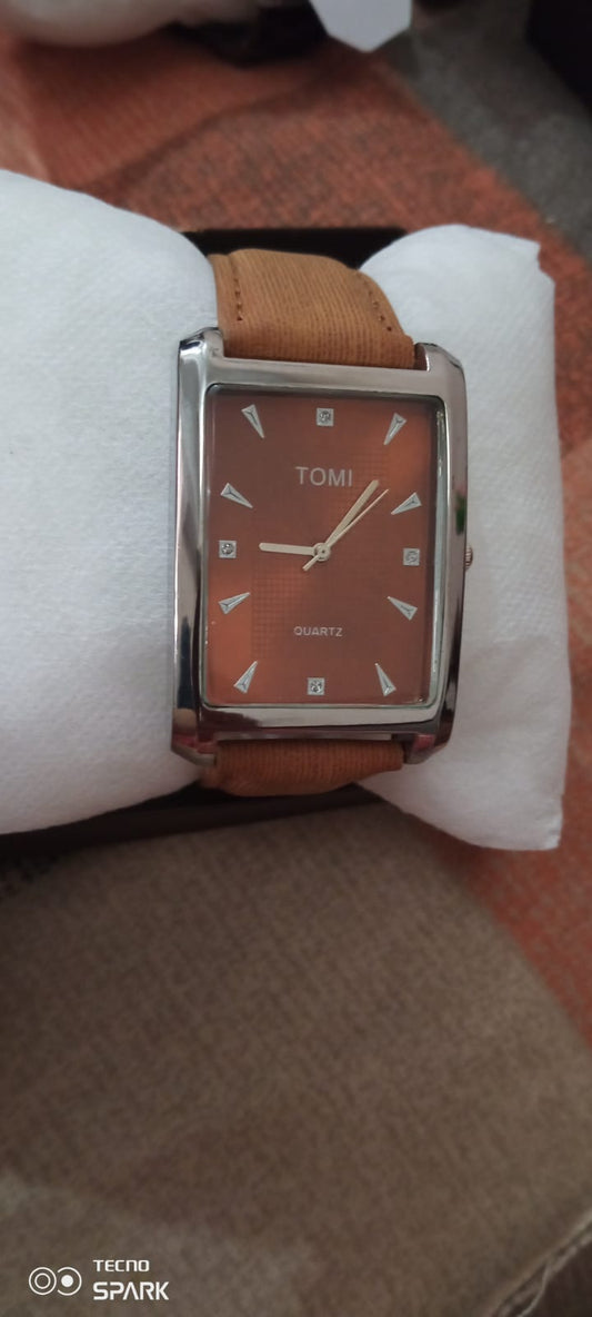 tomi brown dial watch